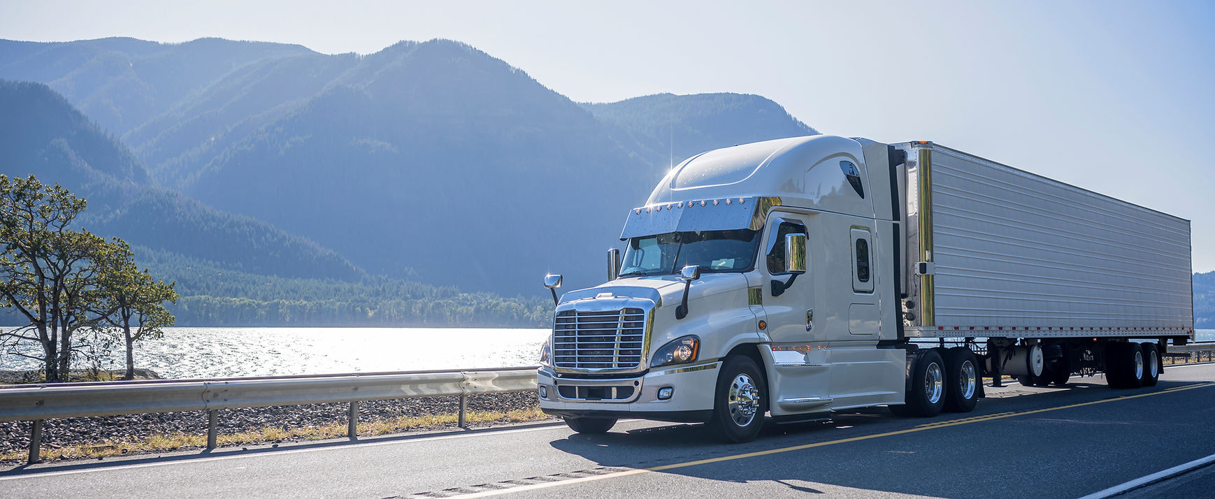 Truck Driving by Lake